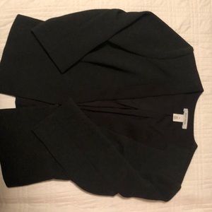 Black collarless jacket.